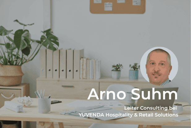 Arno Suhm, Consulting Lead at YUVENDA, pictured in a modern office setting.